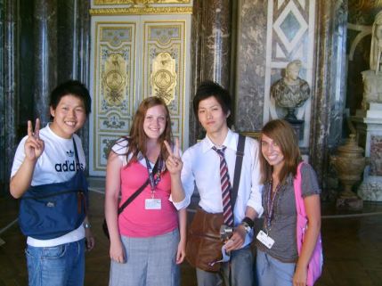 Getting our picture taken with "hot Asians" at the Palace of Versailles. (I'm in pink.)